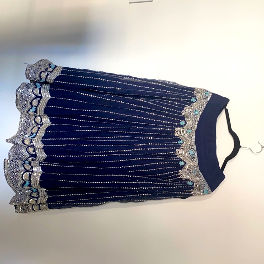 Women's stunning embellished blue silver skirt.